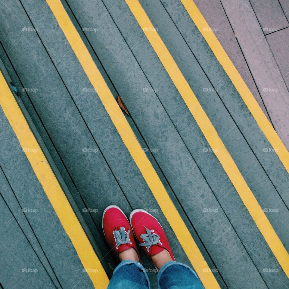 Red sneakers on the road