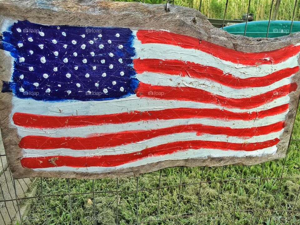 Painted American flag on wood