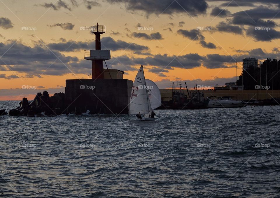 Went for a walk along the sea when I noticed that small boat which was going back to marina. 