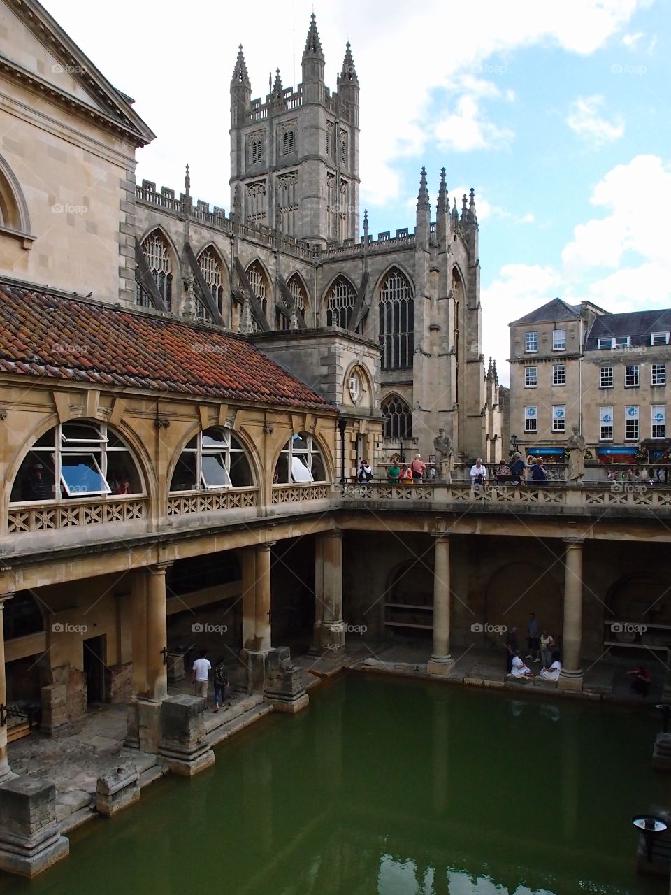 The grand architecture of the Roman Baths in Bath in England on a summer day during travels