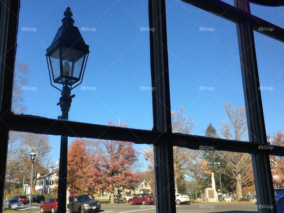 Lantern outside window in fall