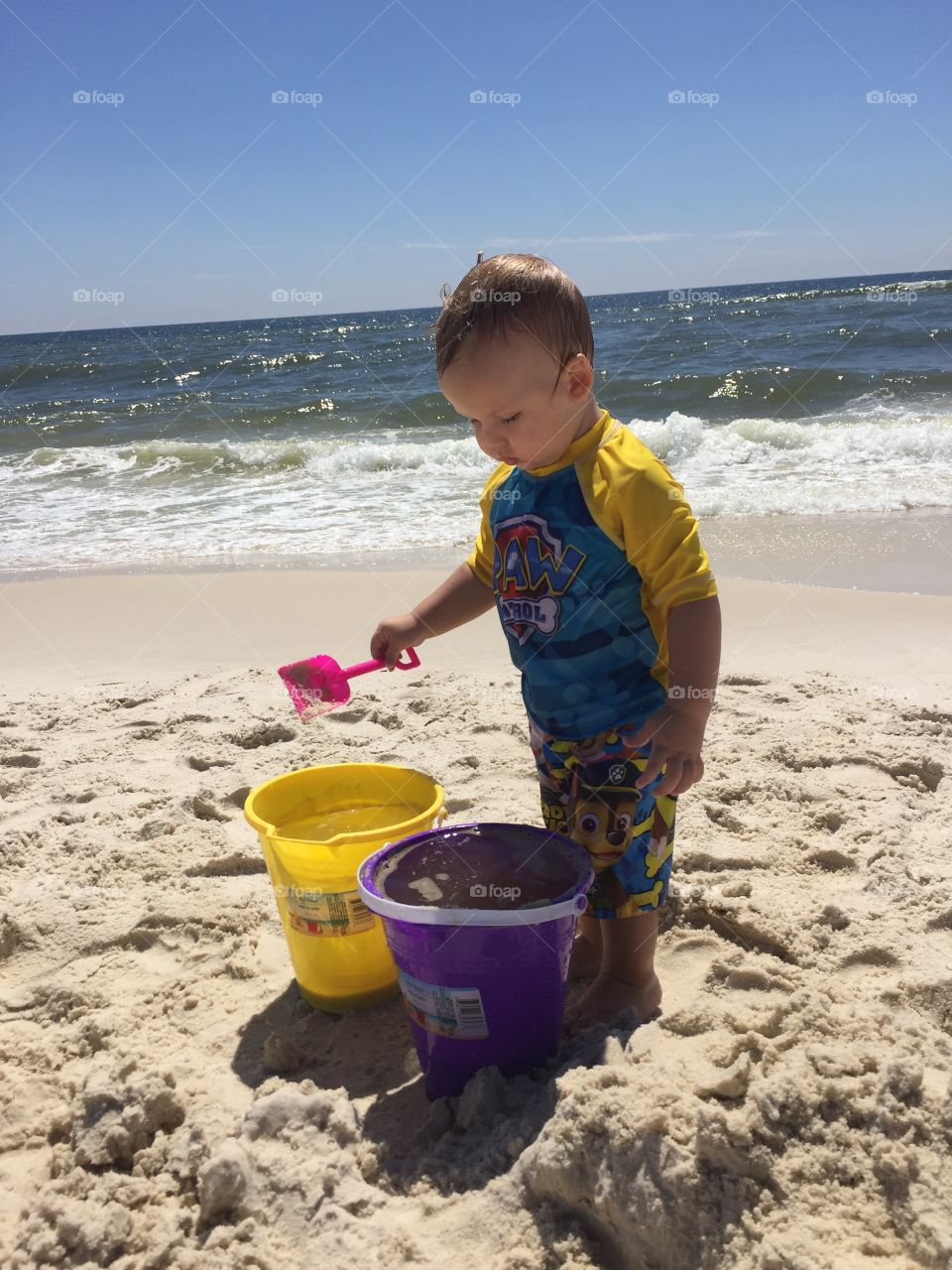 Boy playing on beach