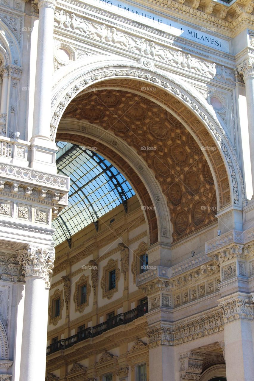 Entrance to the Galeria Vittorio Emanuele shopping centar in the Neo-Renaissance style of Milan,  Italy