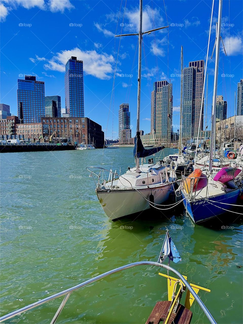 This is “Newtown Creek”, an ocean inlet of the “East River” by the “Pulaski Bridge” in LIC, Queens. The views from here are spectacular. They reach from “Greenpoint”, Bklyn to LIC to “Manhattan”. 2024. Hypnotic Productions