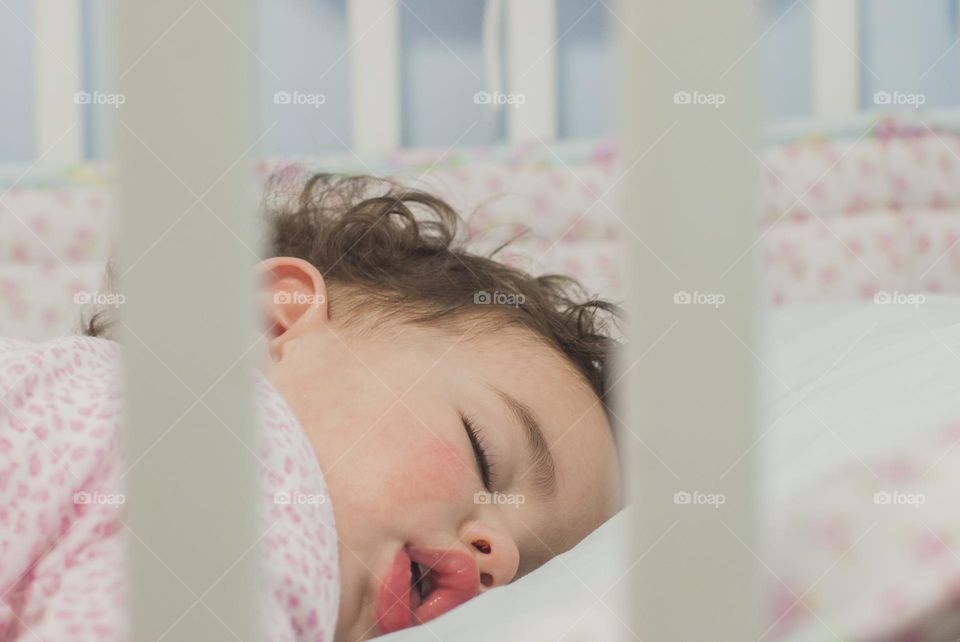 Sleeping baby in crib