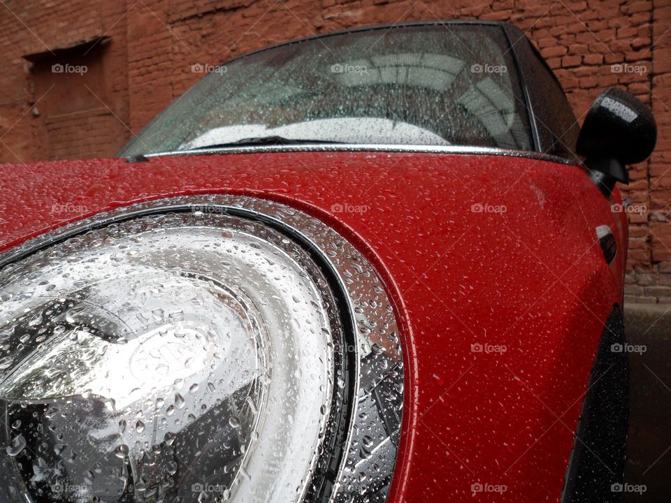 english red car mini on the background wall