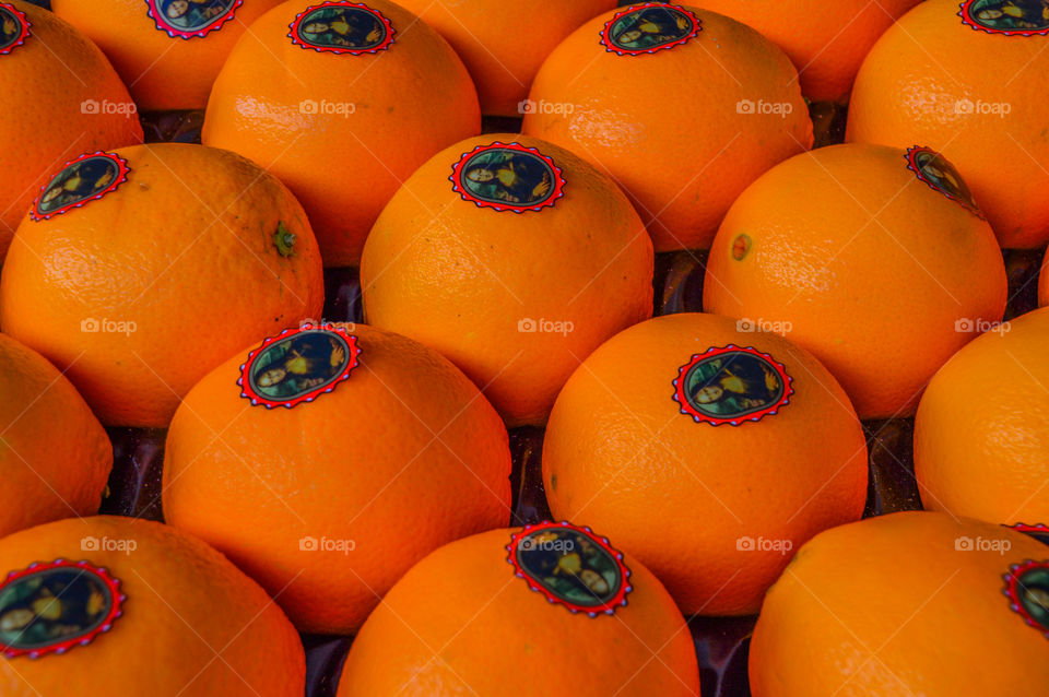 Oranges With Mona Lisa Stickers