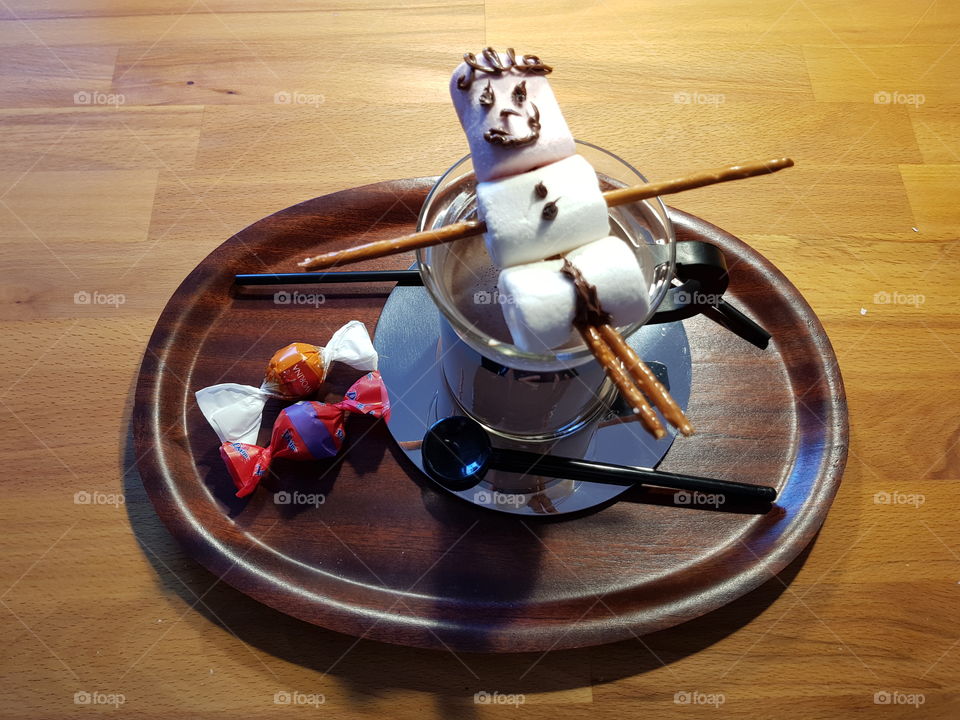 marshmellow snowman on hot chocolate drink