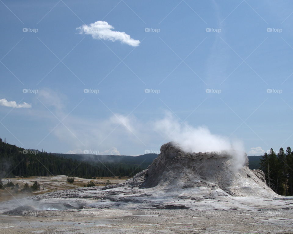 Beautiful, unique, and stunning geology on Geyser Hill in the magnificent Yellowstone National Park on a sunny summer day. 