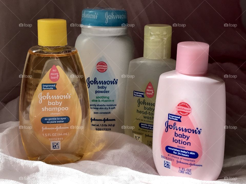 Johnson and Johnson baby products with a soft pink background