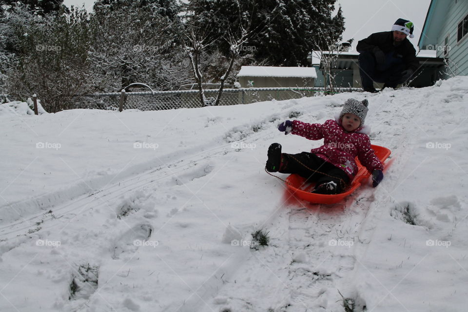 first snow sledding