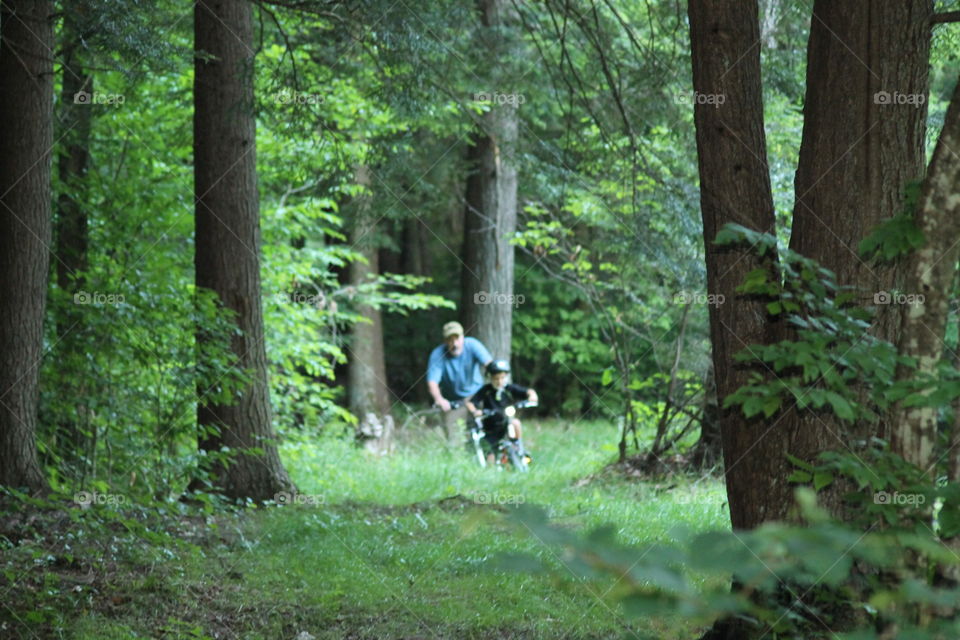 Bicycling adventure. while camping the boys went on a trail behind campsite to explore area