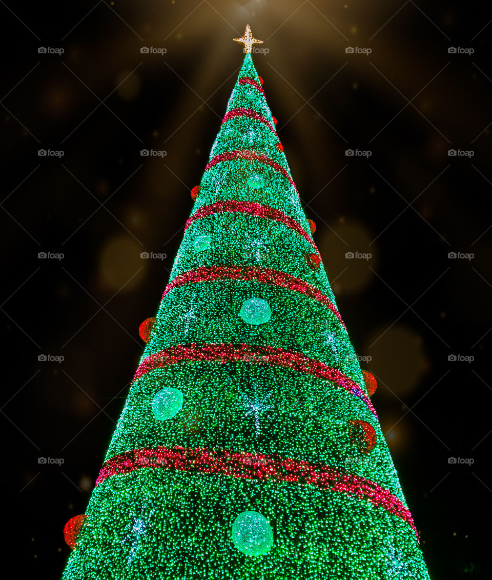 A huge green and red Christmas tree of lights at Praça do Comércio, Lisbon, Christmas 2019