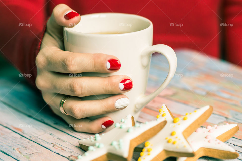 woman hand with cup of tea