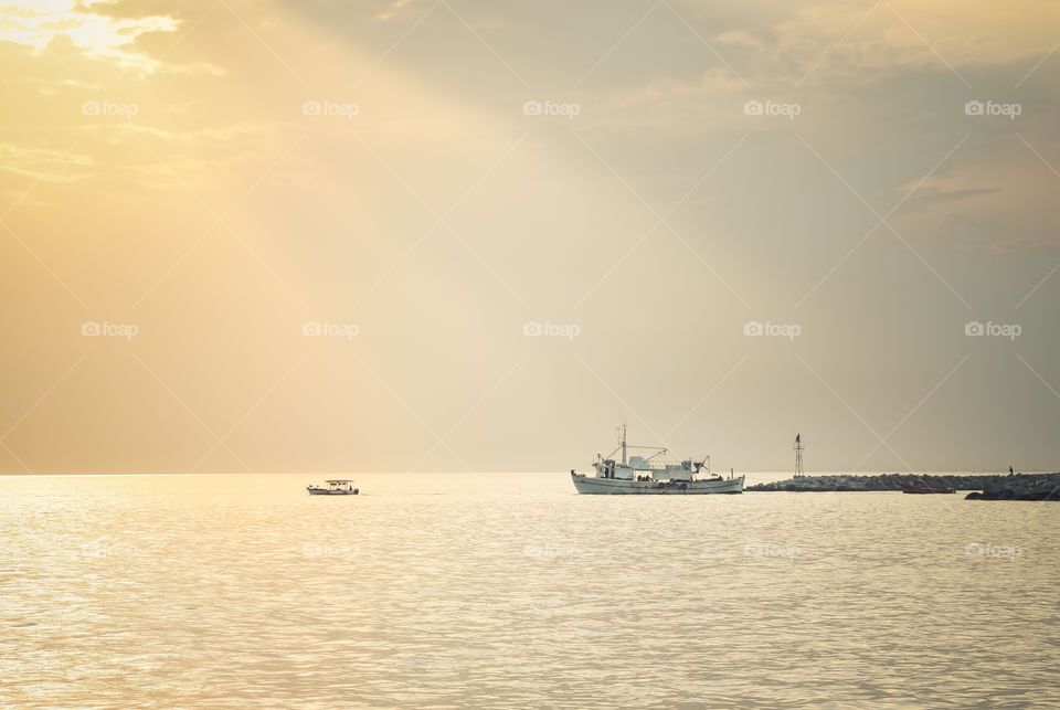 illuminating Sunrays In A Seascape