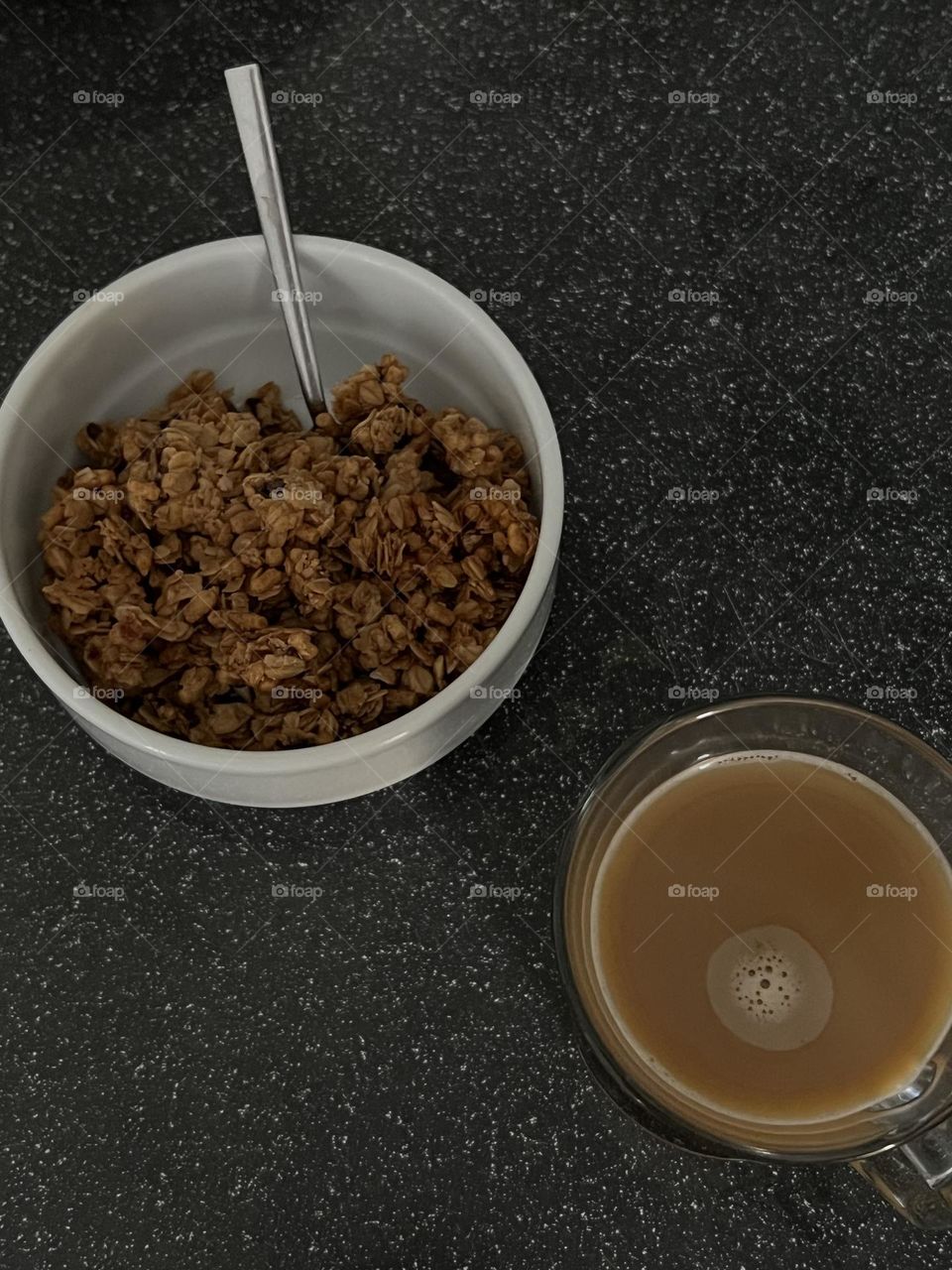 Breakfast of coffee and granola 