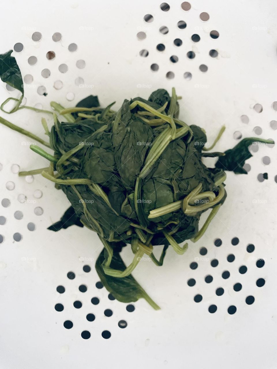 Ball of cooked spinach 