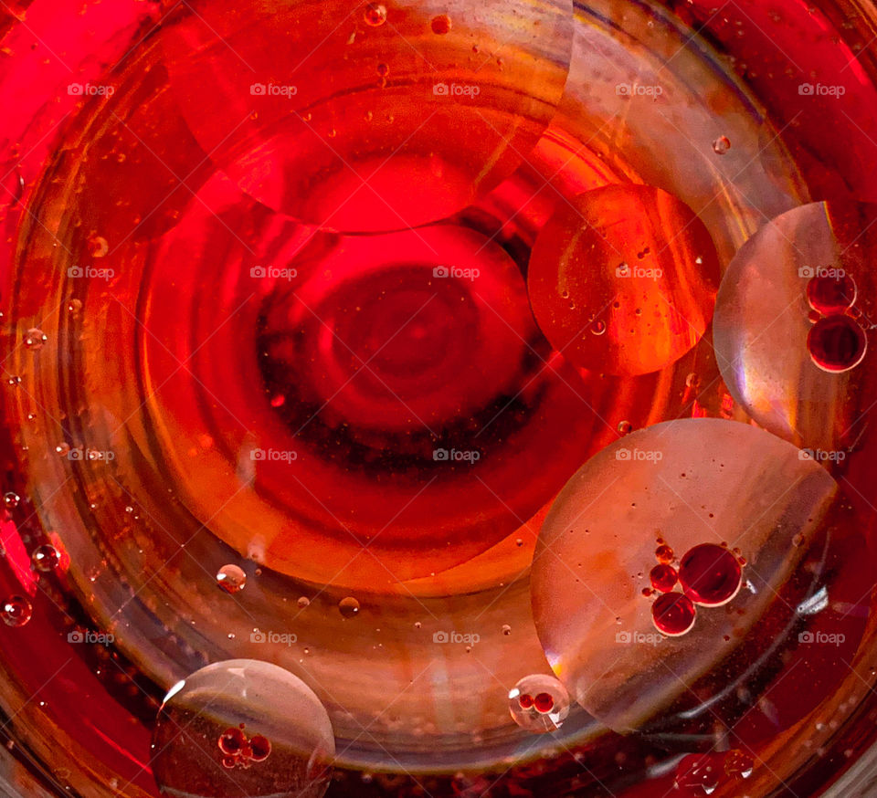 red bubbles from an overhead view of a cup