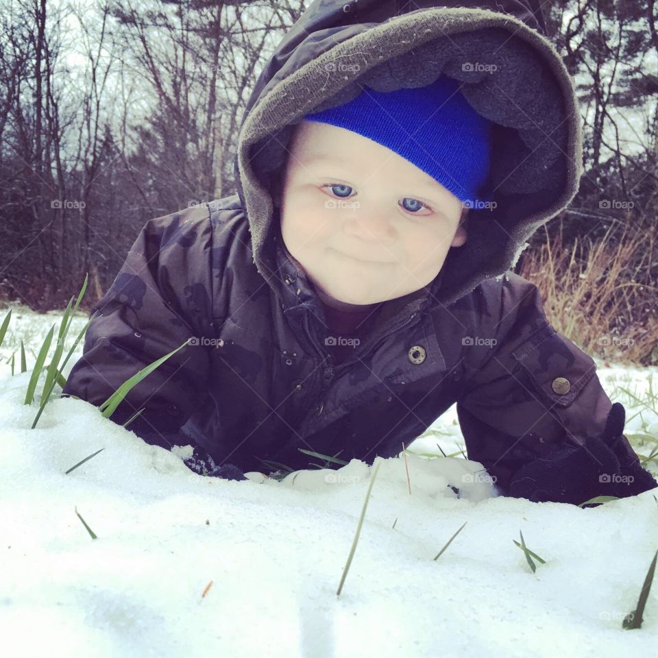 My handsome son playing in the snow for the first time ❄️