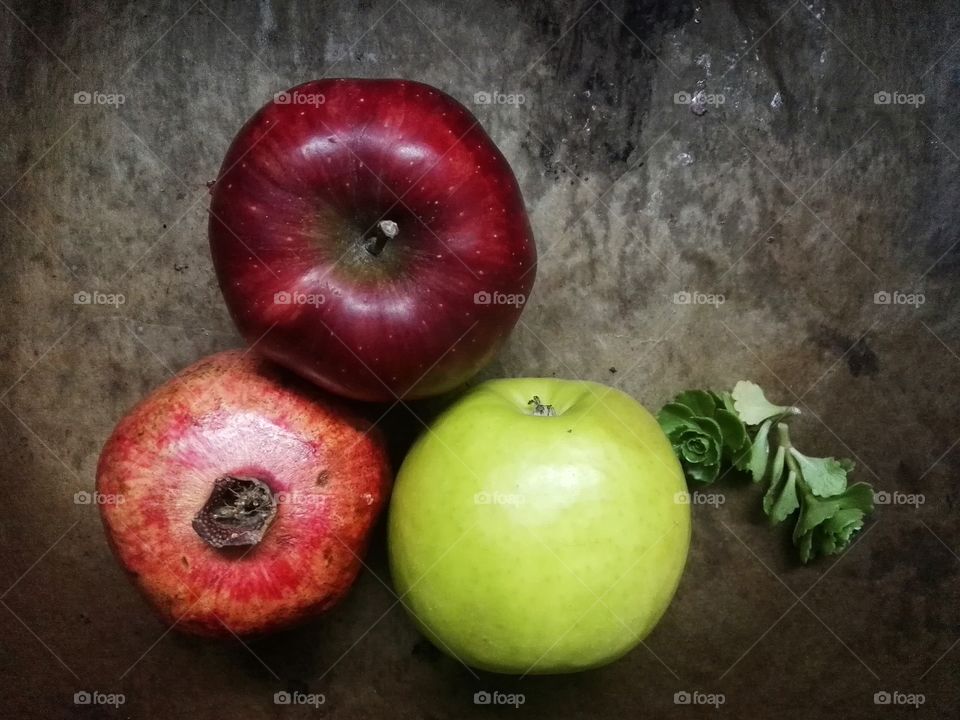 Directly above view of apples and pomegranate