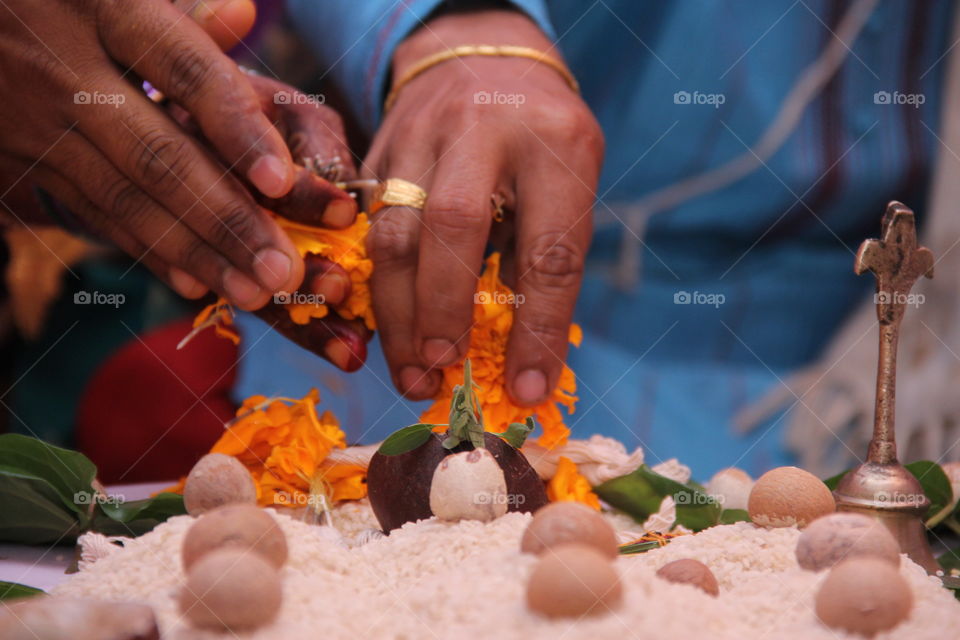 Close-up of areca nuts on rice during wedding ceremony