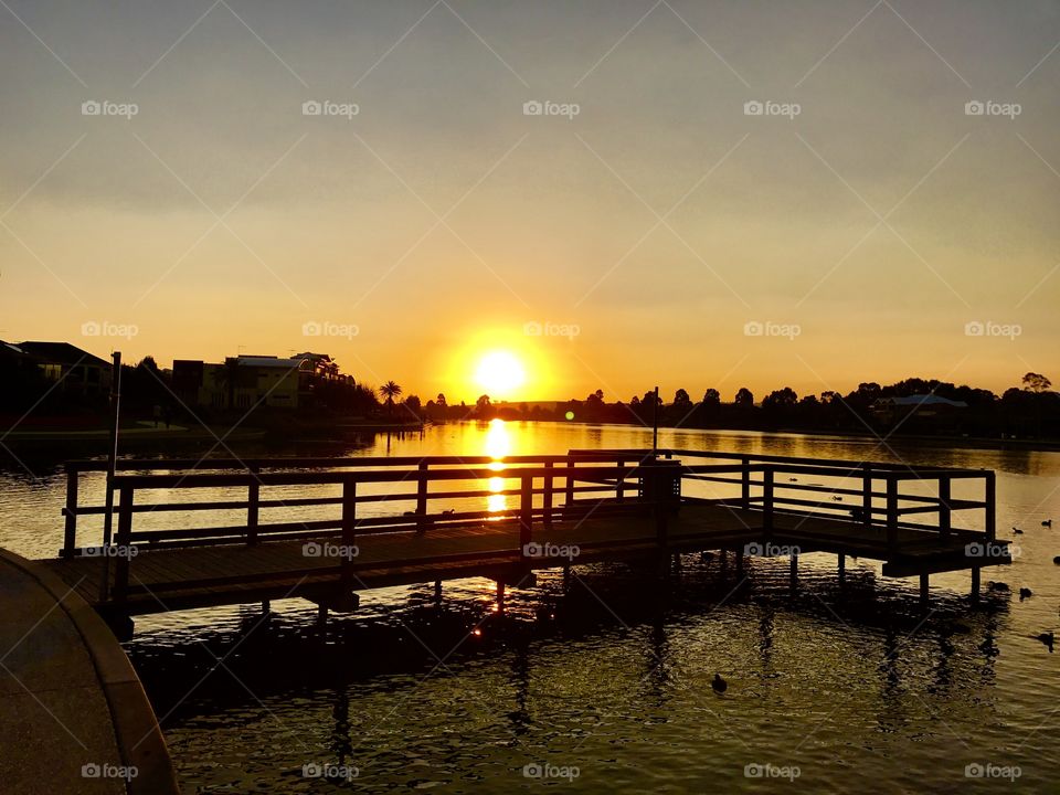 Beautiful sunset over the Jetty around the lake