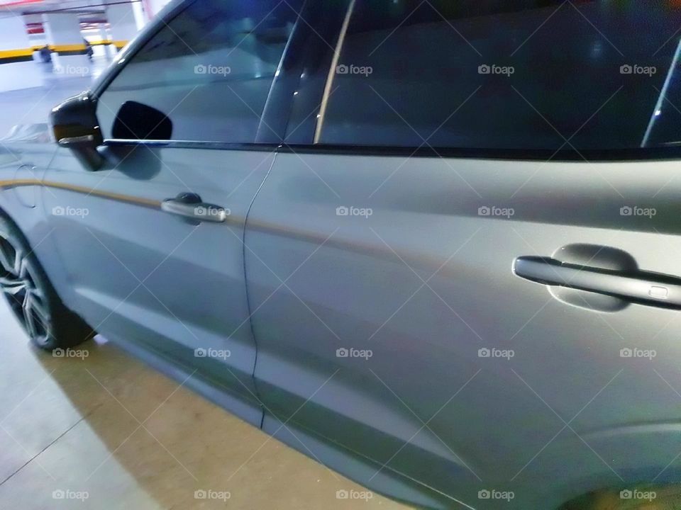 race journey motion business worker detail dealership buying speed power street trip electric futuristic fun vacation xenon electricity rent young model woman electric car parking highway shiny garage engine metallic reflection tire day vehicle car a