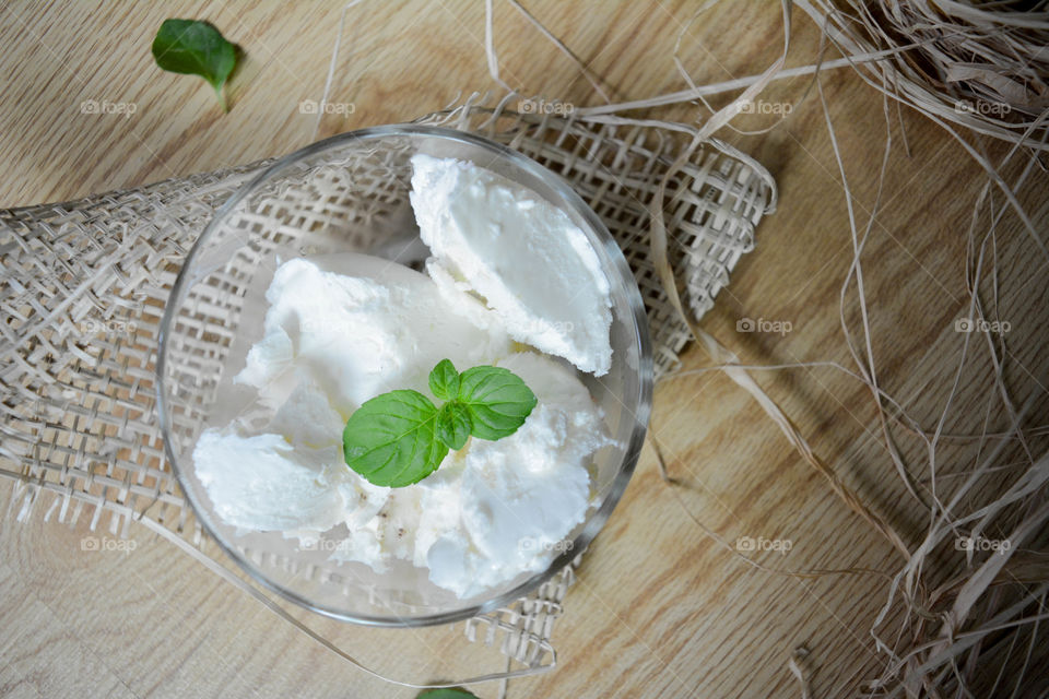 Ice cream in blow with mint leaf
