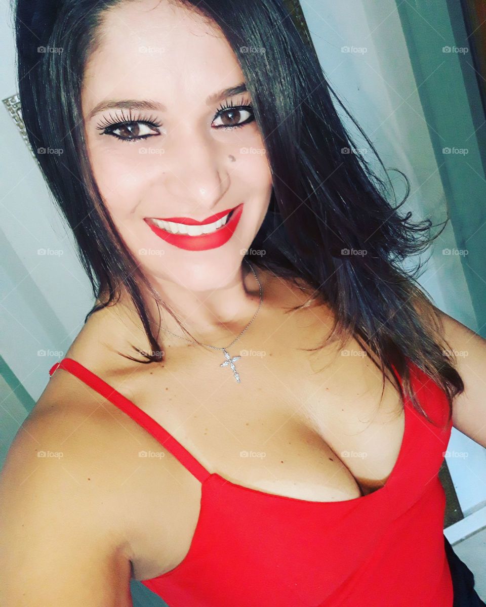 beautiful woman with red blouse and lipstick