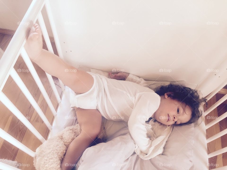 Baby Playing around in Bed