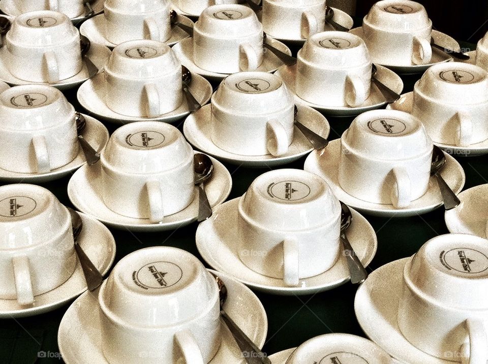 Cups of coffee arrange in a row