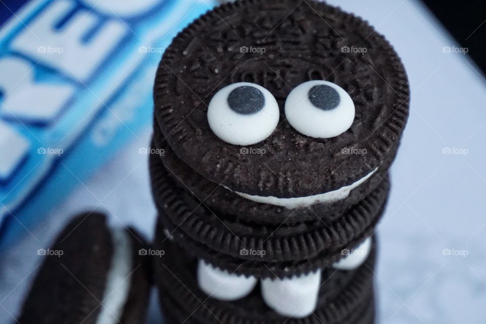 Oreo Cookie Monster with goggly eyes and marshmallow legs