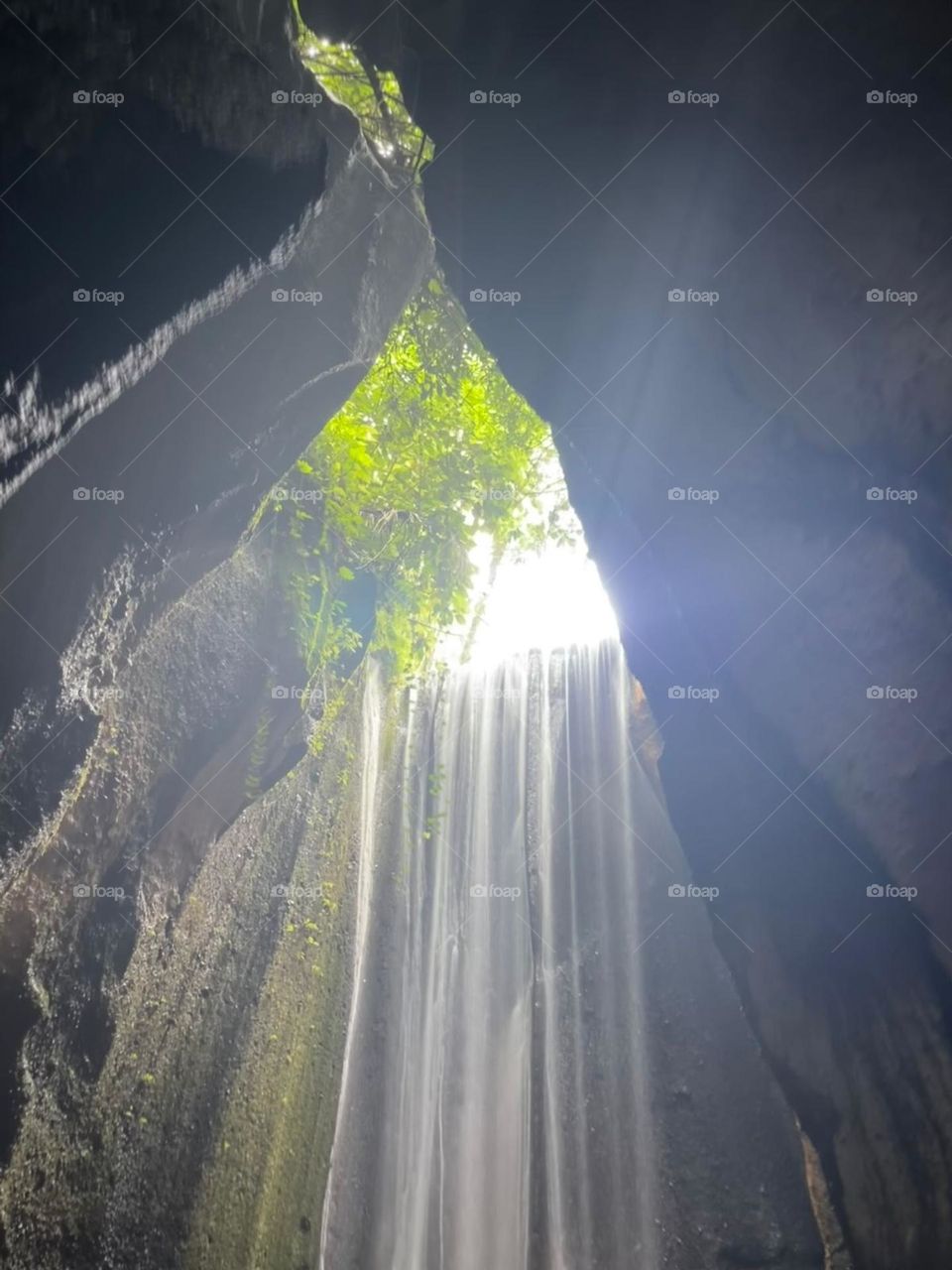 Waterfall between the rocks in Bali