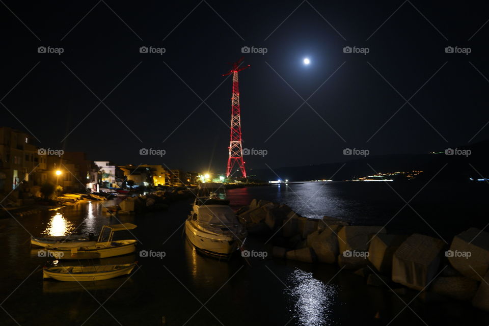 pilone in the night. pilone of messina