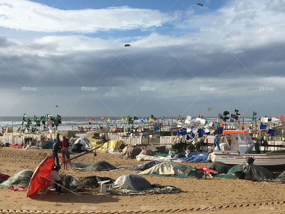 Fishermen job on beach