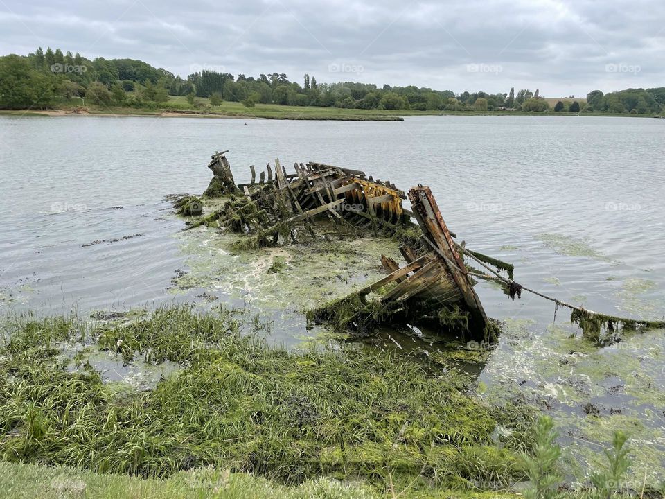 Sunken boat on the river 