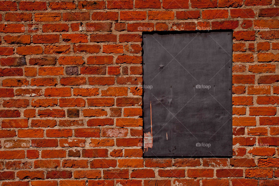 Brick wall with window - insert caption
