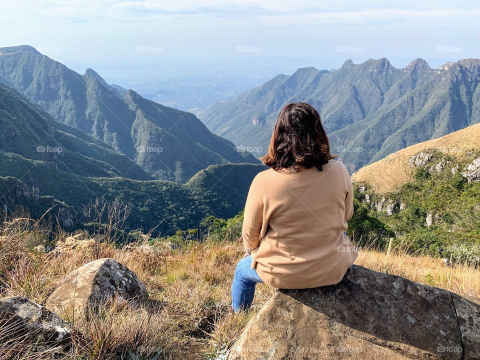 Woman from behind in the canyons of Santa Catarina, Brazil