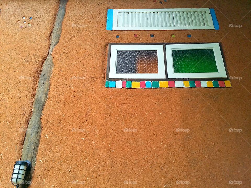 Beautiful decor small white windows on the wall.