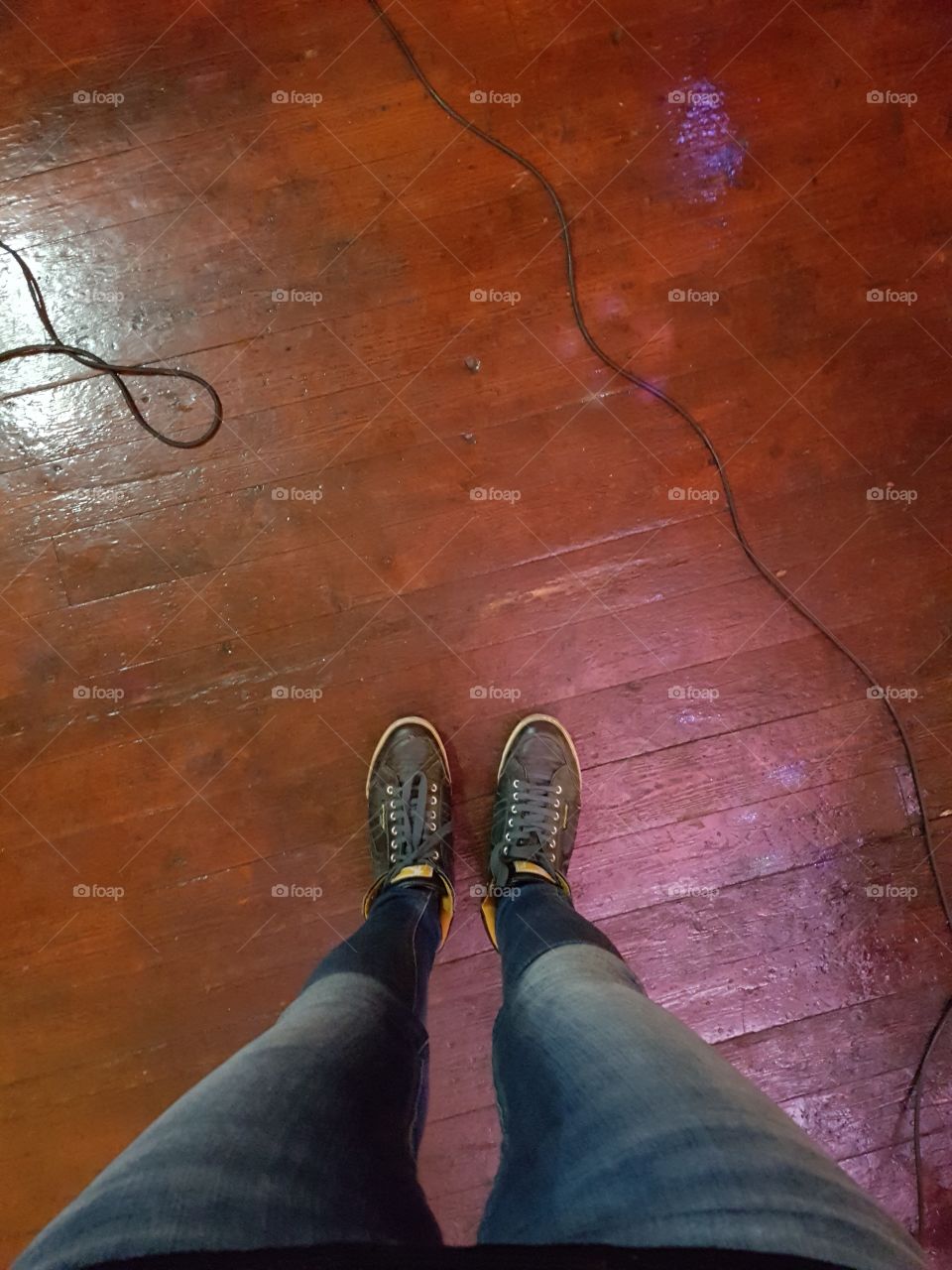 Feet on a stage