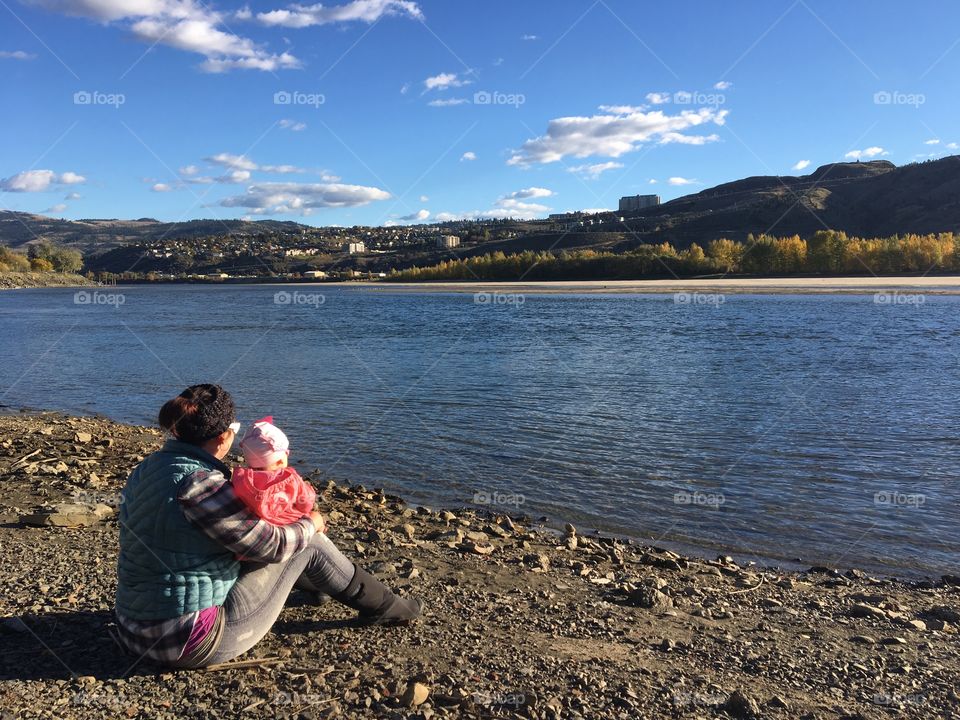 Mother and child overlooking the river 