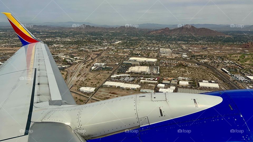 Southwest Airlines Boeing 737 flying over Phoenix Arizona right after taking off from Phoenix Sky Harbor International Airport (PHX)