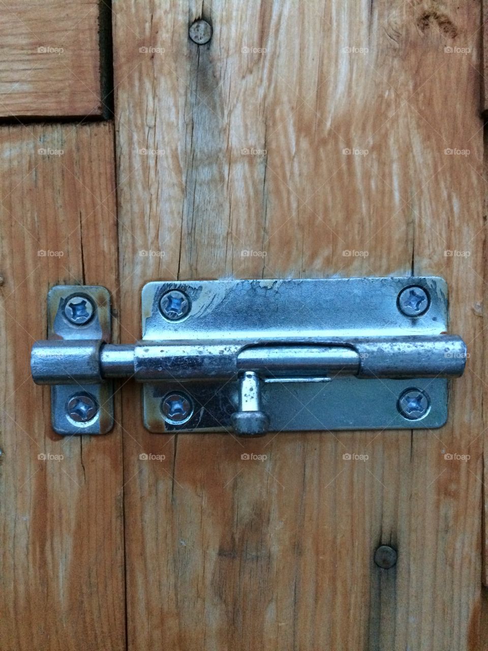 Stainless steel lock on a building 