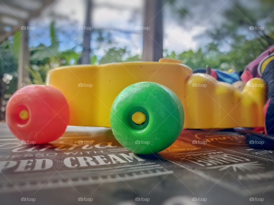 Yellow colored wheel toy