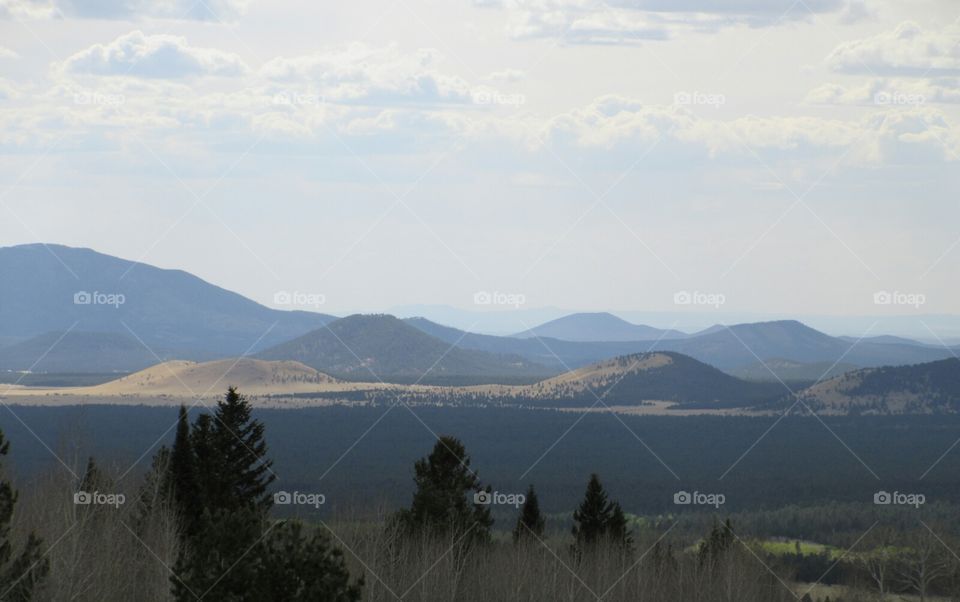 Mountain ranges of the Flagstaff wilderness.
Calm breeze on an afternoon hike.
Lava beds in the distance.
