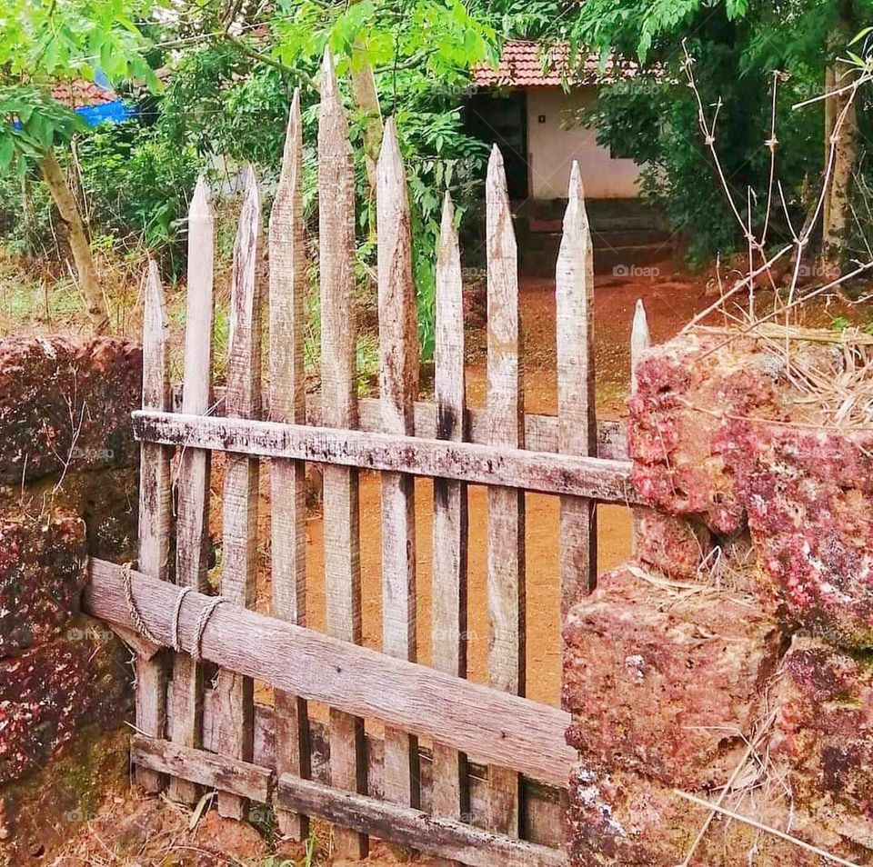 Old wooden fence of rural home in kerala