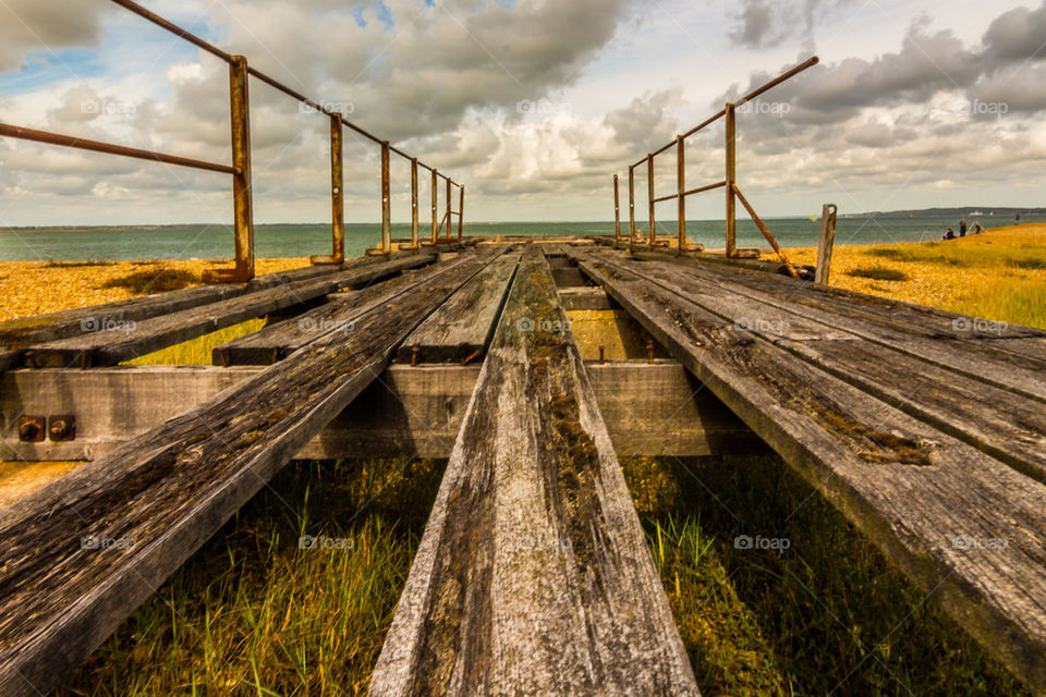 Wooden wharf on beach