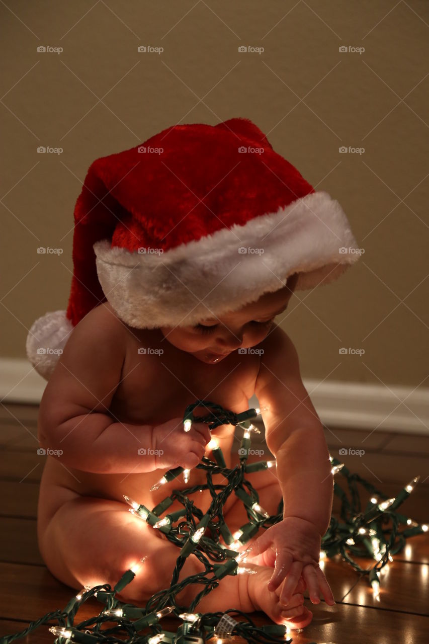 Baby in Christmas Lights