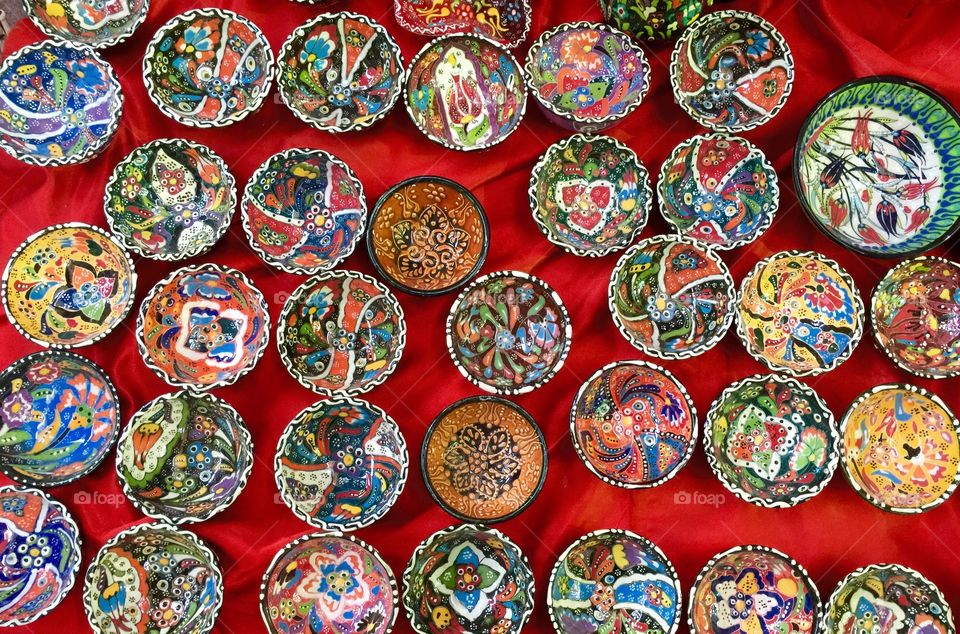 Old souk in Dubai selling colourful bowls 