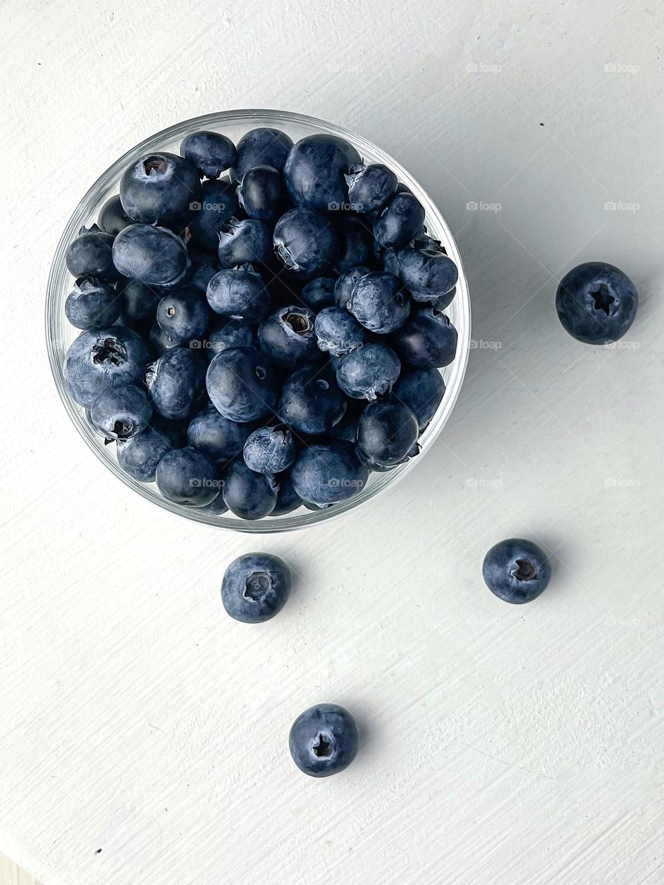 Blueberries in the glass bowl 
